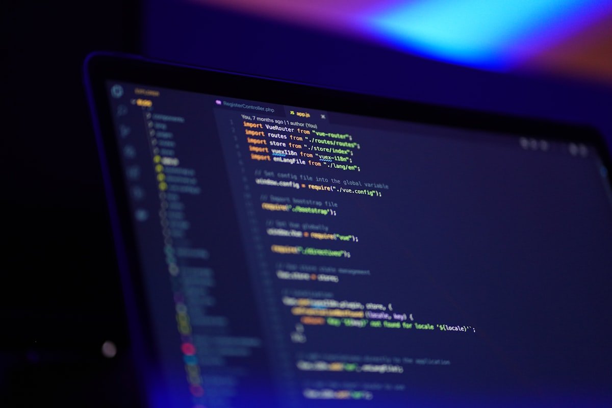 Developer analyzing algorithm complexity and data structures on multiple screens