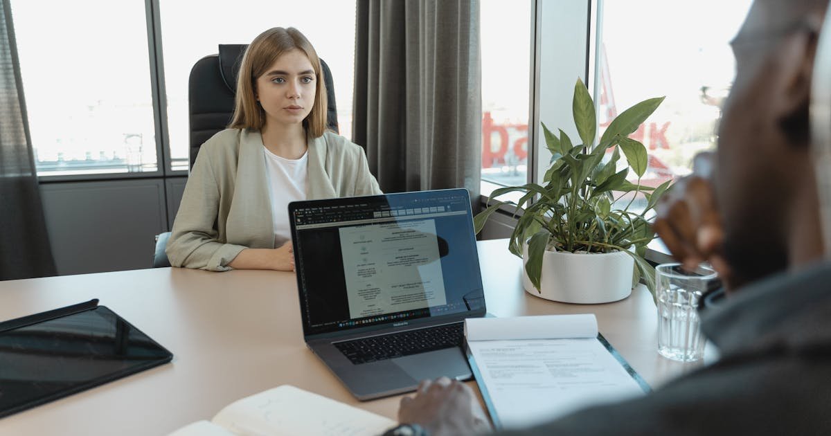 Candidate during a job interview in a modern office setting