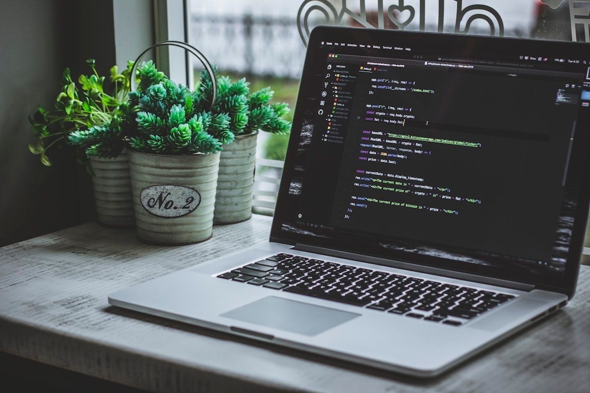 Developer writing code for URL shortener algorithm