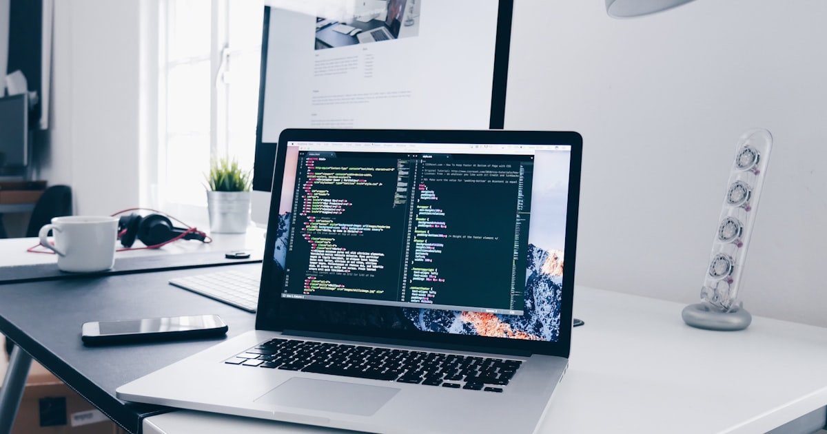 Engineer solving coding problem with AI assistant on screen