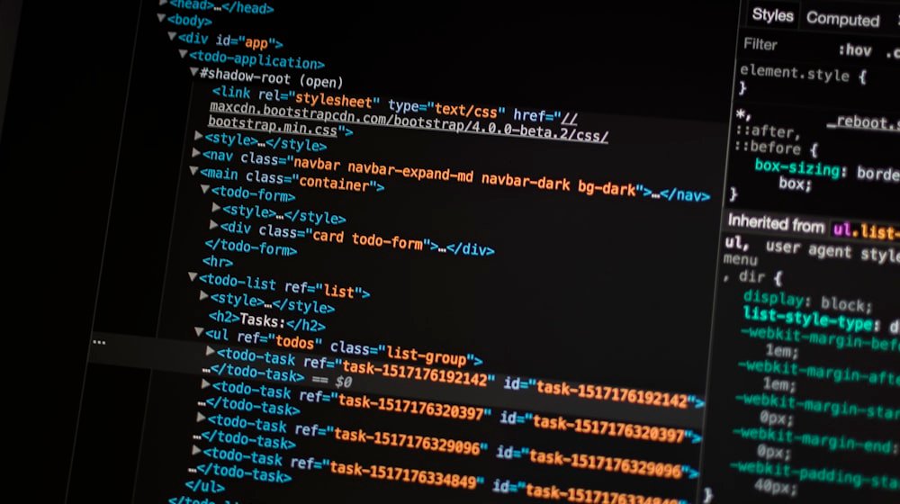 Developer working through an algorithm on a laptop