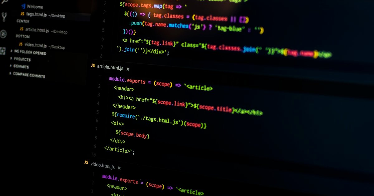 Laptop showing code for solving dynamic programming problems