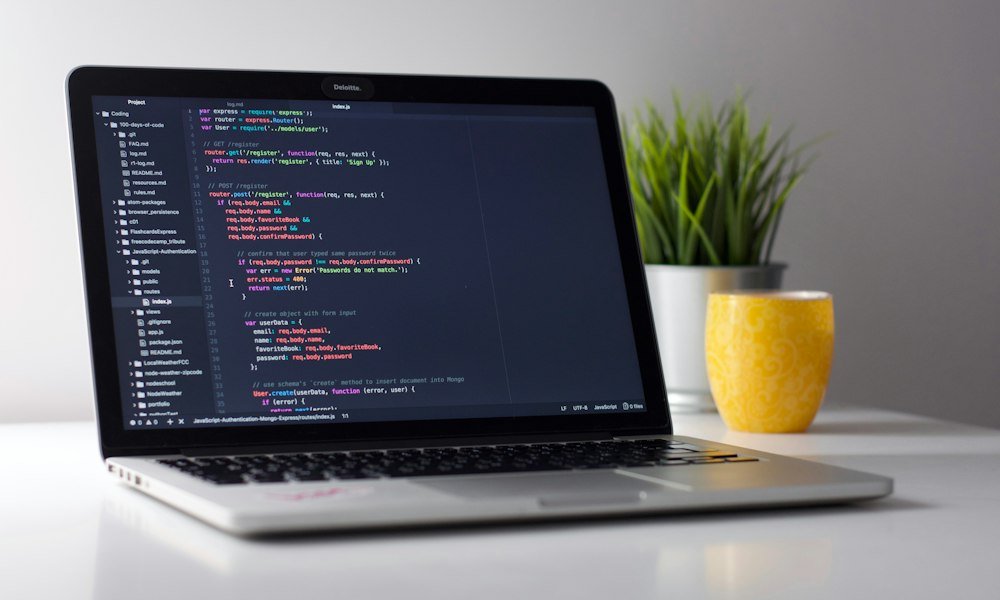 Laptop with code editor open for low-level design interview practice