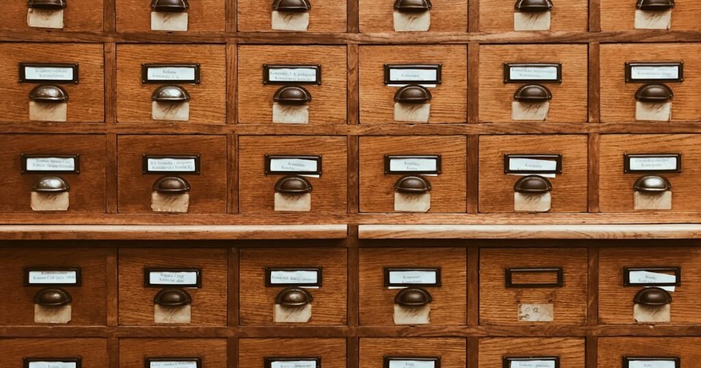 Wooden card catalog drawers representing database indexes and SQL tables